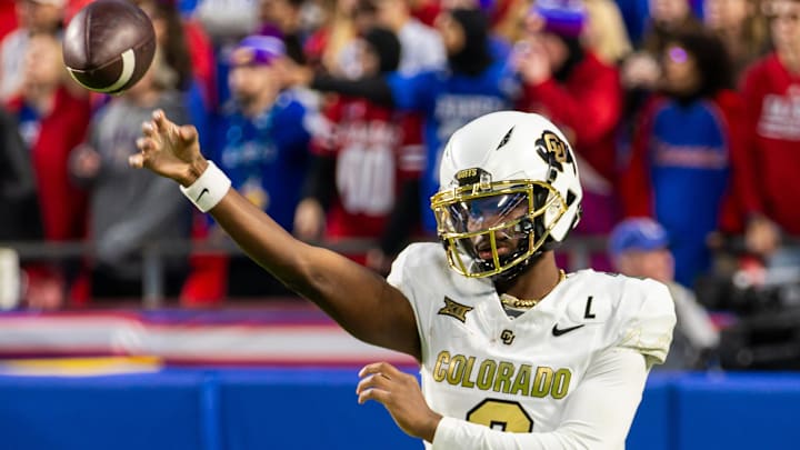 Nov 23, 2024; Kansas City, Missouri, USA; Colorado quarterback Shedeur Sanders (2) warms up during the 4th quarter between the Kansas Jayhawks and the Colorado Buffaloes at GEHA Field at Arrowhead Stadium. Mandatory Credit: Nick Tre. Smith-Imagn Images Nov 23, 2024; Kansas City, Missouri, USA; Colorado quarterback Shedeur Sanders (2) warms up during the 4th quarter between the Kansas Jayhawks and the Colorado Buffaloes at GEHA Field at Arrowhead Stadium. Mandatory Credit: Nick Tre. Smith-Imagn Images