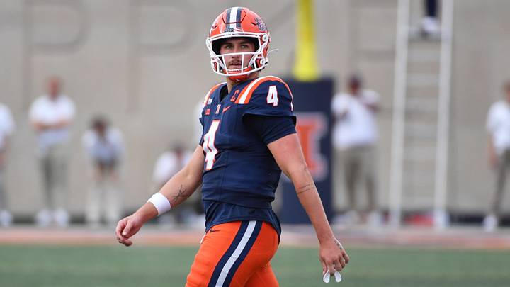 Sep 12, 2026; Champaign, Illinois, USA;  Illinois Fighting Illini quarterback Katin Houser (4) walks off the field during the second half against the Duke Blue Devils at Gies Memorial Stadium.  Mandatory Credit: Ron Johnson-Imagn Images