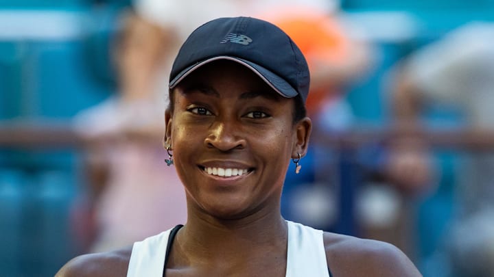 Coco Gauff poses with a trophy Coco Gauff poses with a trophy