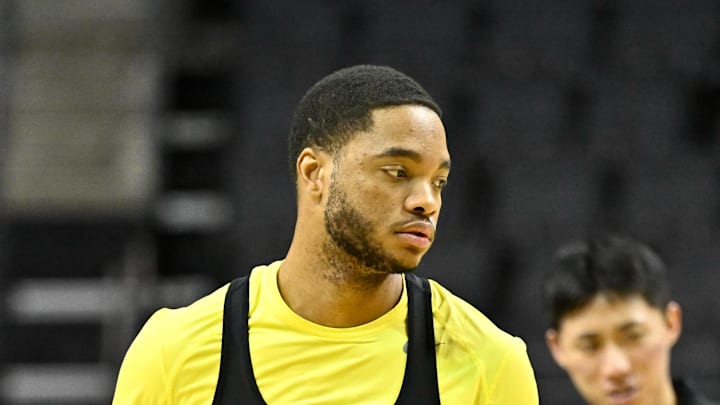 Feb 25, 2026; Eugene, Oregon, USA; Oregon Ducks forward Kwame Evans Jr. (10) warms up on the court before the game against the Wisconsin Badgers at Matthew Knight Arena.