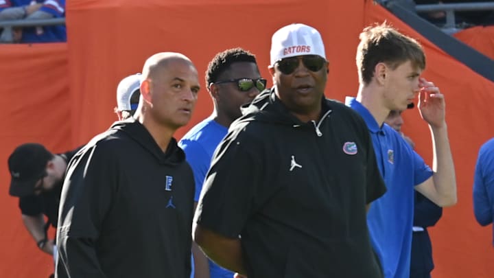 Florida Gators wide receivers coach Billy Gonzales and running backs coach Jabbar Juluke ahead of the team's matchup against Tulane.