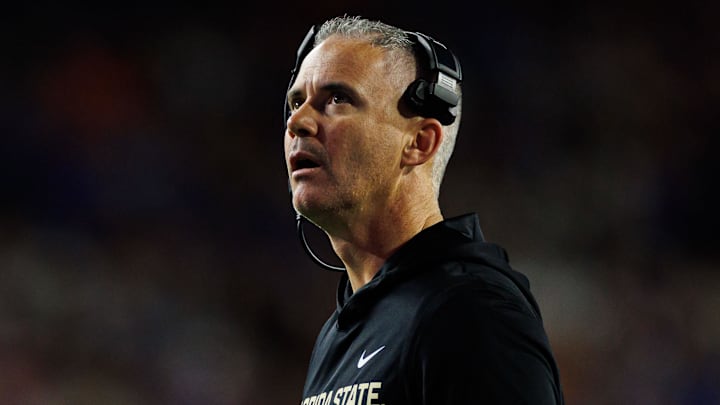 Nov 29, 2025; Gainesville, Florida, USA; Florida State Seminoles head coach Mike Norvell looks on against the Florida Gators during the second half at Ben Hill Griffin Stadium. Mandatory Credit: Matt Pendleton-Imagn Images Nov 29, 2025; Gainesville, Florida, USA; Florida State Seminoles head coach Mike Norvell looks on against the Florida Gators during the second half at Ben Hill Griffin Stadium. Mandatory Credit: Matt Pendleton-Imagn Images