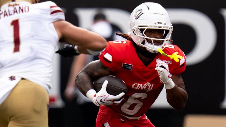 Cincinnati Bearcats running back Gi'Bran Payne (6) runs the ball in the second quarter of the football game between East Central High School and Elder High School in West Price Hill on Friday, September 4, 2026.
