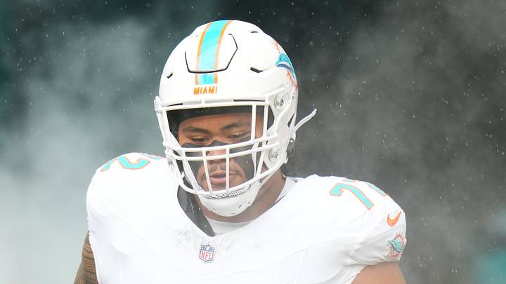 Miami Dolphins guard Jonah Savaiinaea