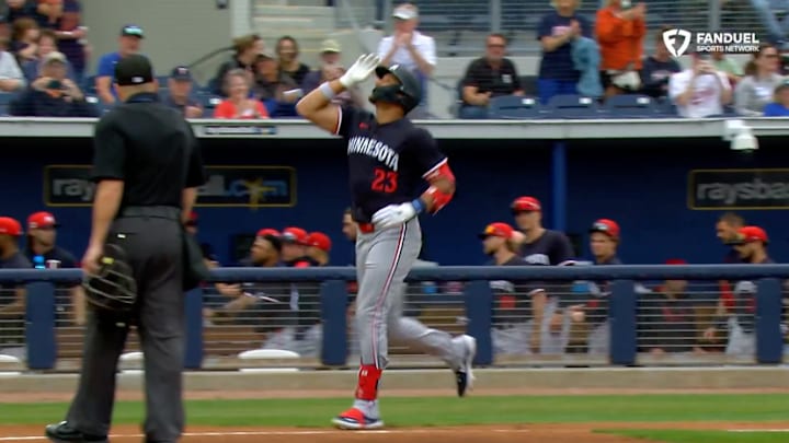 Royce Lewis celebrates the Twins' first home run of spring training