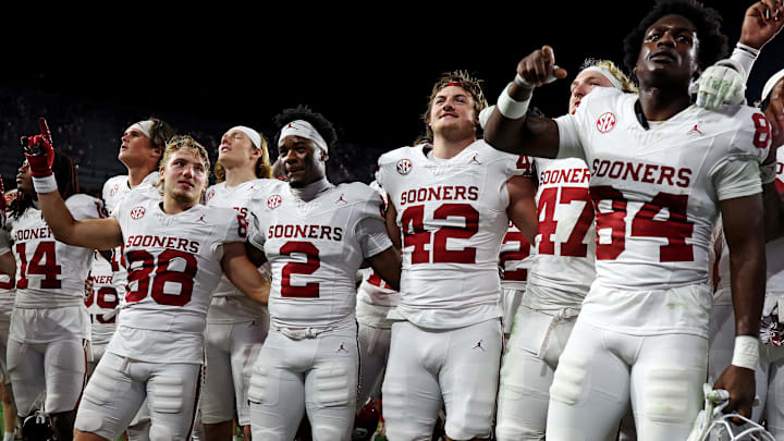 The Oklahoma Sooners celebrate after beating Alabama.