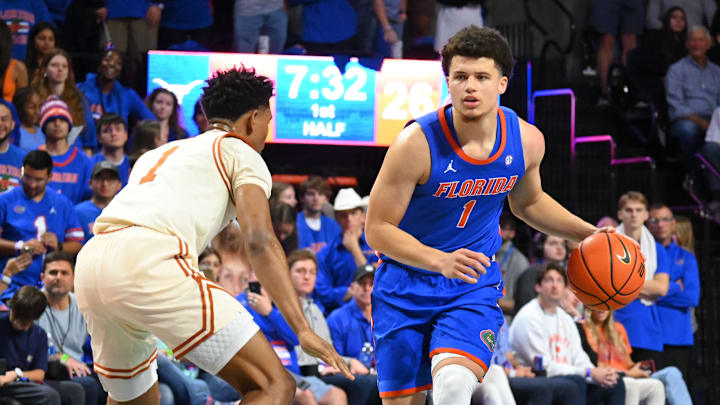 Walter Clayton Jr. tied Michael Frazier II's program record of 41 consecutive games with a made 3-pointer in the fifth-ranked Florida Gators 84-60 win over Texas.