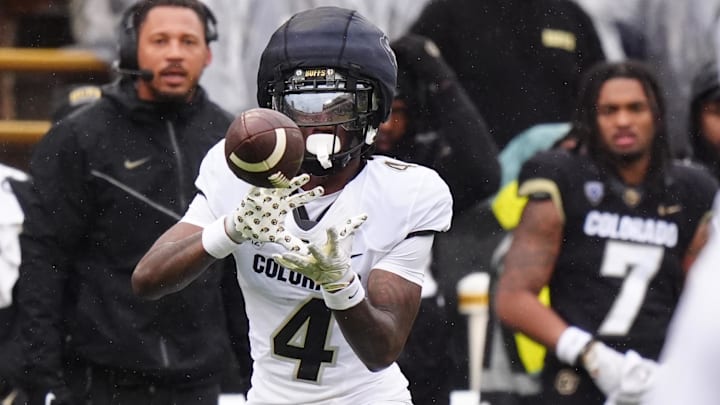 Apr 27, 2024; Boulder, CO, USA; Colorado Buffaloes wide receiver Omarion Miller (4) prepares to catch the ball during a spring game event at Folsom Field. Mandatory Credit: Ron Chenoy-Imagn Images Apr 27, 2024; Boulder, CO, USA; Colorado Buffaloes wide receiver Omarion Miller (4) prepares to catch the ball during a spring game event at Folsom Field. Mandatory Credit: Ron Chenoy-Imagn Images