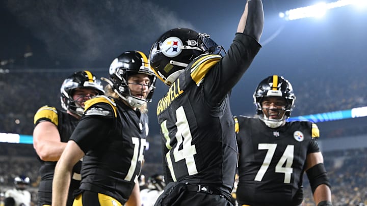Jan 4, 2026; Pittsburgh, Pennsylvania, USA; Pittsburgh Steelers running back Kenneth Gainwell (14)reacts after rushing for a touchdown against the Baltimore Ravens during the second half at Acrisure Stadium. Mandatory Credit: Barry Reeger-Imagn Images