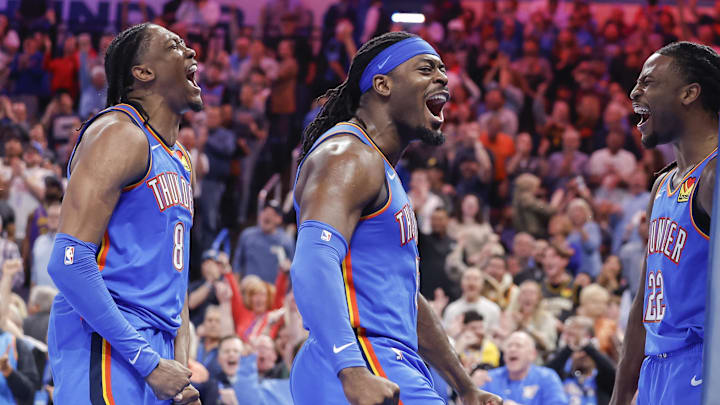 Apr 8, 2025; Oklahoma City, Oklahoma, USA; Oklahoma City Thunder forward Jalen Williams (8), guard Luguentz Dort (5) celebrate with Oklahoma City Thunder guard Cason Wallace (22) after he made a basket against the Los Angeles Lakers during the second half at Paycom Center. Mandatory Credit: Alonzo Adams-Imagn Images
