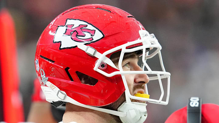 Jan 4, 2026; Paradise, Nevada, USA; Kansas City Chiefs tight end Travis Kelce (87) watches a play against the Las Vegas Raiders from the sideline during the second quarter at Allegiant Stadium. Mandatory Credit: Stephen R. Sylvanie-Imagn Images