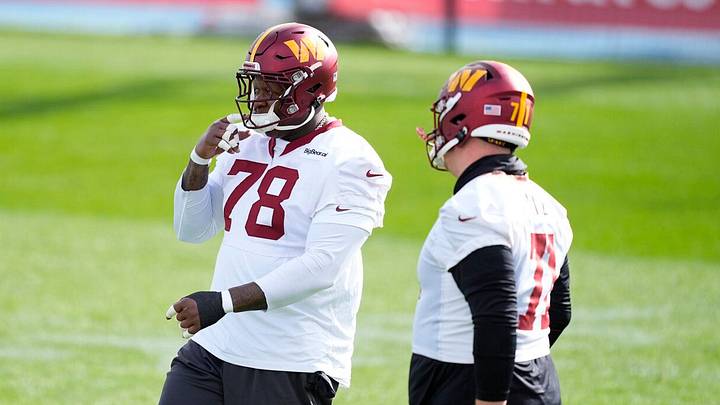 Washington Commanders offensive linemen Laremy Tunsil and Andrew Wylie take part in practice during training camp in Ashburn, Va. Washington Commanders offensive linemen Laremy Tunsil and Andrew Wylie take part in practice during training camp in Ashburn, Va.
