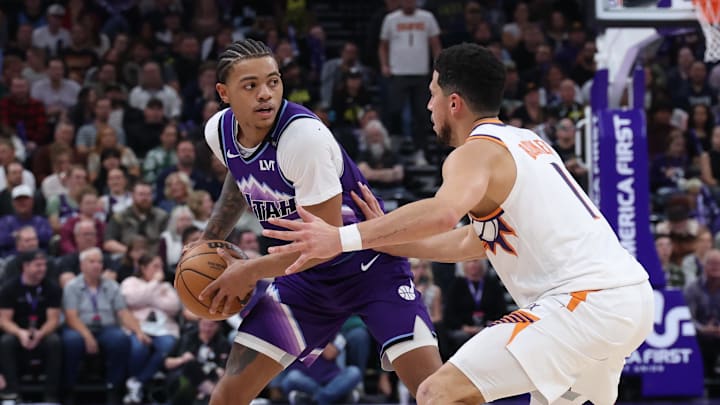 Oct 27, 2025; Salt Lake City, Utah, USA; Utah Jazz guard Keyonte George (3) looks for the play against Phoenix Suns guard Devin Booker (1) during the second half at Delta Center. Mandatory Credit: Rob Gray-Imagn Images Oct 27, 2025; Salt Lake City, Utah, USA; Utah Jazz guard Keyonte George (3) looks for the play against Phoenix Suns guard Devin Booker (1) during the second half at Delta Center. Mandatory Credit: Rob Gray-Imagn Images