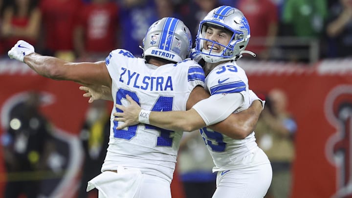 Detroit Lions place kicker Jake Bates (39) celebrates with tight end Shane Zylstra (84). Detroit Lions place kicker Jake Bates (39) celebrates with tight end Shane Zylstra (84).
