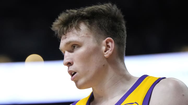 Jul 12, 2024; Las Vegas, NV, USA;  Los Angeles Lakers forward Dalton Knecht (4) competes during the first half against the Houston Rockets at the Thomas & Mack Center. Mandatory Credit: Lucas Peltier-USA TODAY Sports