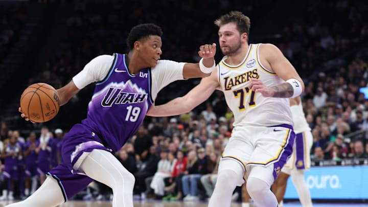 Nov 23, 2025; Salt Lake City, Utah, USA; Utah Jazz guard Ace Bailey (19) drives against Los Angeles Lakers guard Luka Doncic (77) during the second half at Delta Center. Mandatory Credit: Rob Gray-Imagn Images Nov 23, 2025; Salt Lake City, Utah, USA; Utah Jazz guard Ace Bailey (19) drives against Los Angeles Lakers guard Luka Doncic (77) during the second half at Delta Center. Mandatory Credit: Rob Gray-Imagn Images
