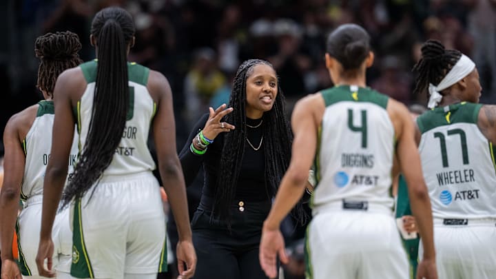 Aug 30, 2025; Seattle, Washington, USA; Seattle Storm head coach Noelle Quinn talks to her team during the second half against the Chicago Sky at Climate Pledge Arena. Mandatory Credit: Stephen Brashear-Imagn Images