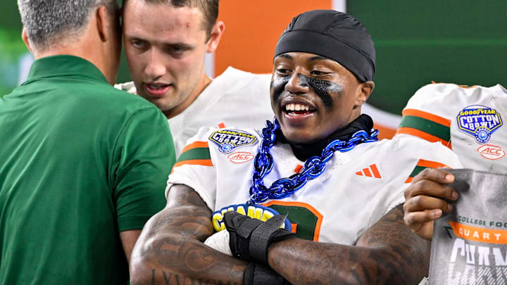 Dec 31, 2025; Arlington, TX, USA; Miami Hurricanes defensive back Keionte Scott (0) celebrates after the 2025 Cotton Bowl and quarterfinal game of the College Football Playoff at AT&T Stadium. Mandatory Credit: Jerome Miron-Imagn Images