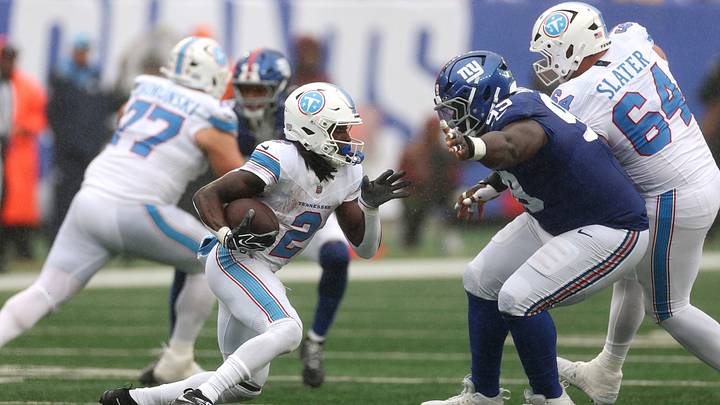 Sep 27, 2026; East Rutherford, New Jersey, USA; Tennessee Titans running back Tyjae Spears (2) runs with the ball against New York Giants defensive tackle C.J. Okoye (99) during the second quarter at MetLife Stadium. Mandatory Credit: Vincent Carchietta-Imagn Images Sep 27, 2026; East Rutherford, New Jersey, USA; Tennessee Titans running back Tyjae Spears (2) runs with the ball against New York Giants defensive tackle C.J. Okoye (99) during the second quarter at MetLife Stadium. Mandatory Credit: Vincent Carchietta-Imagn Images