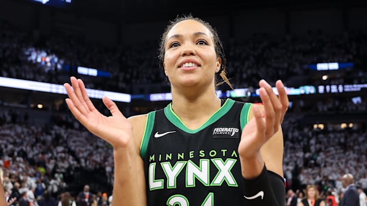 Minnesota Lynx forward Napheesa Collier celebrates a team win.