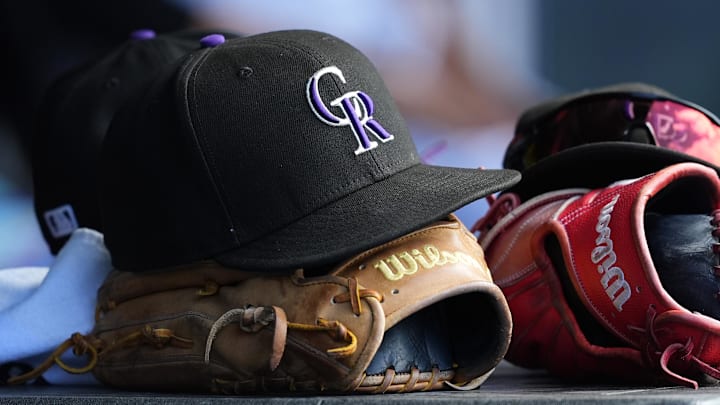 Jul 6, 2025; Denver, Colorado, USA; General view of a players cap and glove of the Colorado Rockies during the ninth inning against the Chicago White Sox at Coors Field. Mandatory Credit: Ron Chenoy-Imagn Images Jul 6, 2025; Denver, Colorado, USA; General view of a players cap and glove of the Colorado Rockies during the ninth inning against the Chicago White Sox at Coors Field. Mandatory Credit: Ron Chenoy-Imagn Images
