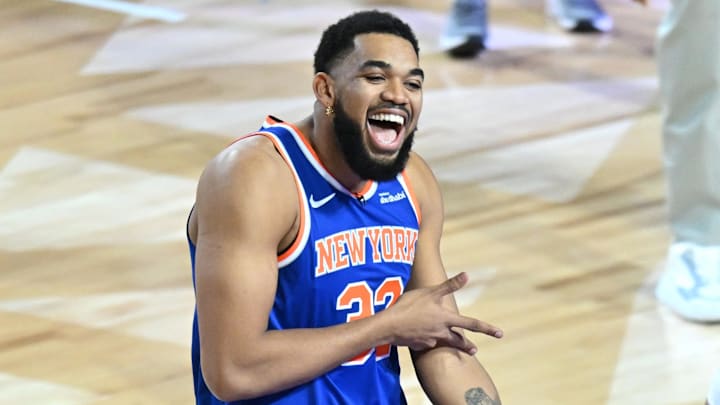 Feb 14, 2026; Los Angeles, CA, USA; Team Knicks guard Jalen Brunson (11) of the New York Knicks and center Karl-Anthony Towns (32) of the New York Knicks react in the shooting stars competition during the 2026 NBA All Star Saturday Night at Intuit Dome. Mandatory Credit: William Liang-Imagn Images