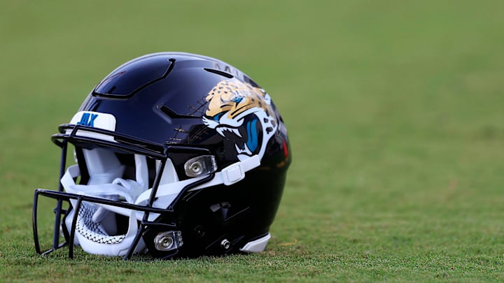 A Jacksonville Jaguars helmet lies on the turf Wednesday, July 26, 2023 at Miller Electric Center at EverBank Stadium in Jacksonville, Fla. Today marked the first day of training camp for the Jacksonville Jaguars.