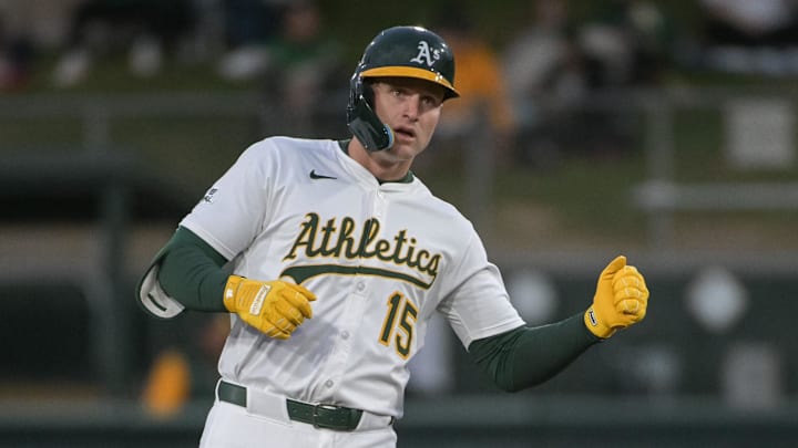 Apr 24, 2025; West Sacramento, California, USA; Athletics outfielder Seth Brown (15) motions to his team mates after hitting a double against the Texas Rangers during the second inning at Sutter Health Park. Mandatory Credit: Ed Szczepanski-Imagn Images