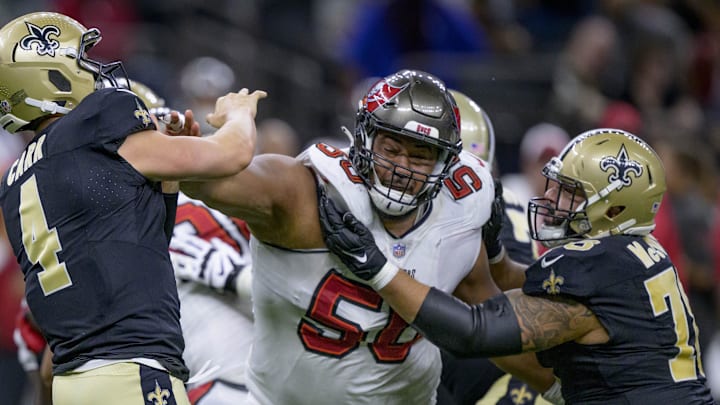 Oct 1, 2023; New Orleans, Louisiana, USA; Tampa Bay Buccaneers defensive tackle Vita Vea (50) pressures New Orleans Saints quarterback Derek Carr (4) while being defended by New Orleans Saints center Erik McCoy (78) during the fourth quarter at the Caesars Superdome. Mandatory Credit: Matthew Hinton-Imagn Images