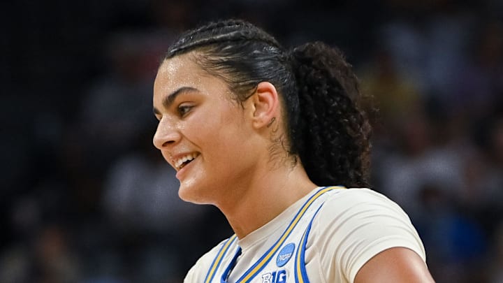 Mar 29, 2026; Sacramento, CA, USA; UCLA Bruins forward Angela Dugalić (32) and center Lauren Betts (51) celebrate after defeating the Duke Blue Devils in an Elite Eight game in the Sacramento Regional 4 of the women's 2026 NCAA Tournament at the Golden 1 Center. Mandatory Credit: Ed Szczepanski-Imagn Images
