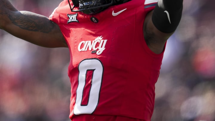 Oct 11, 2025; Cincinnati, Ohio, USA; Cincinnati Bearcats cornerback Matthew McDoom (0) reacts during a stop in play against the UCF Knights in the second half at Nippert Stadium. Mandatory Credit: Aaron Doster-Imagn Images Oct 11, 2025; Cincinnati, Ohio, USA; Cincinnati Bearcats cornerback Matthew McDoom (0) reacts during a stop in play against the UCF Knights in the second half at Nippert Stadium. Mandatory Credit: Aaron Doster-Imagn Images