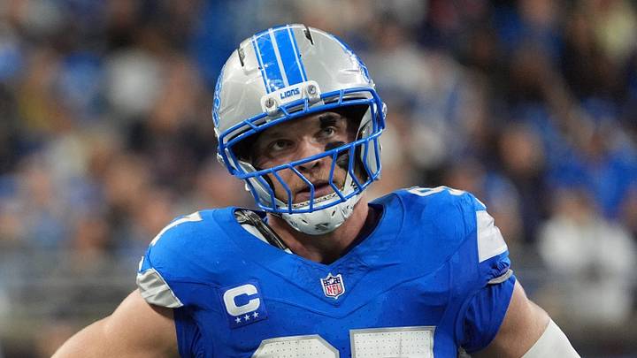 Detroit Lions defensive end Aidan Hutchinson (97) looks on, with Detroit Lions head coach Dan Campbell in the foreground during the first half of the NFL game at Ford Field in Detroit, Sunday, Sept. 27, 2026. Detroit Lions defensive end Aidan Hutchinson (97) looks on, with Detroit Lions head coach Dan Campbell in the foreground during the first half of the NFL game at Ford Field in Detroit, Sunday, Sept. 27, 2026.