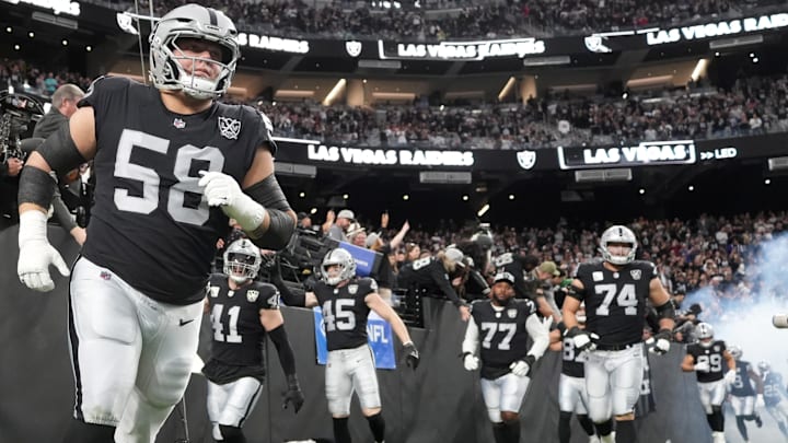 Dec 22, 2024; Paradise, Nevada, USA; Las Vegas Raiders guard Jackson Powers-Johnson (58) enters the field before the game against the Jacksonville Jaguars at Allegiant Stadium. Mandatory Credit: Kirby Lee-Imagn Images