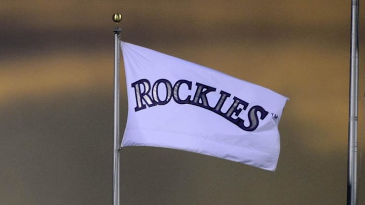  General view of a Colorado Rockies banner during a sunset over Coors Field. 
