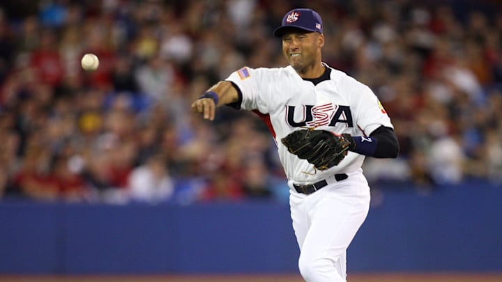 Mar 7, 2009; Toronto, ON, Canada; USA shortstop Derek Jeter (2) throws out Canada shortstop Chris Barnwell (not pictured) in the 2nd inning during first round pool play at the 2009 World Baseball Classic at the Rogers Centre in Toronto, ON. USA beat Canada 6-5. Mandatory Credit: Tom Szczerbowski-Imagn Images