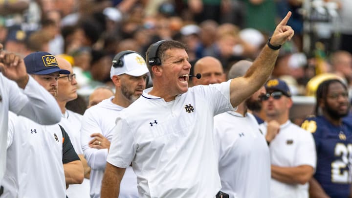 Sep 20, 2025; South Bend, Indiana, USA; Notre Dame Fighting Irish defensive coordinator Chris Ash shouts towards the field against the Purdue Boilermakers during the first half at Notre Dame Stadium. Mandatory Credit: Michael Caterina-Imagn Images
