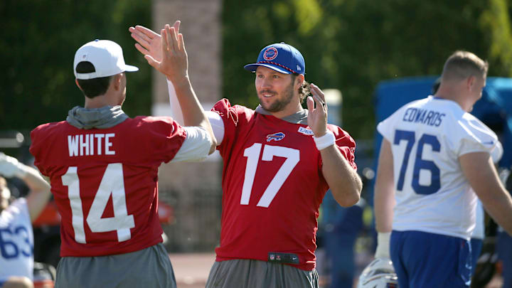Bills quarterback Josh Allen works on his pre-game handshake with teammate Mike White during Buffalo Bills training camp at St. John Fisher University on Wednesday, July 23, 2025 in Pittsford.