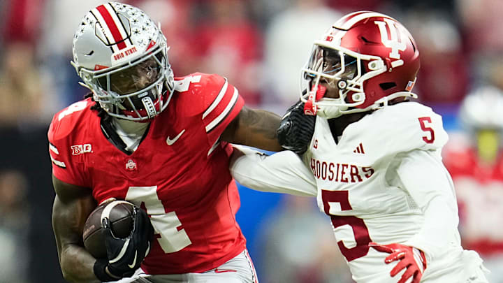 Ohio State Buckeyes wide receiver Jeremiah Smith (4) shakes off Indiana Hoosiers defensive back D'Angelo Ponds (5) during the Big Ten Conference championship game at Lucas Oil Stadium in Indianapolis on Dec. 6, 2025. Ohio State lost 13-10. Ohio State Buckeyes wide receiver Jeremiah Smith (4) shakes off Indiana Hoosiers defensive back D'Angelo Ponds (5) during the Big Ten Conference championship game at Lucas Oil Stadium in Indianapolis on Dec. 6, 2025. Ohio State lost 13-10.