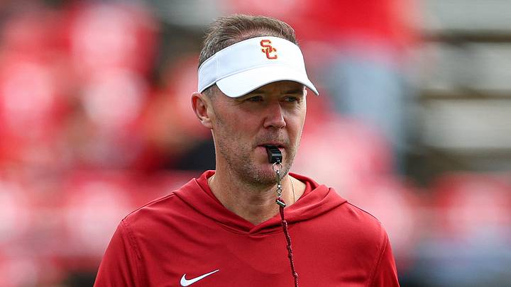 Sep 19, 2026; Piscataway, New Jersey, USA; USC Trojans head coach Lincoln Riley on the field during warm-ups before the game against the Rutgers Scarlet Knights at SHI Stadium. Mandatory Credit: Vincent Carchietta-Imagn Images Sep 19, 2026; Piscataway, New Jersey, USA; USC Trojans head coach Lincoln Riley on the field during warm-ups before the game against the Rutgers Scarlet Knights at SHI Stadium. Mandatory Credit: Vincent Carchietta-Imagn Images
