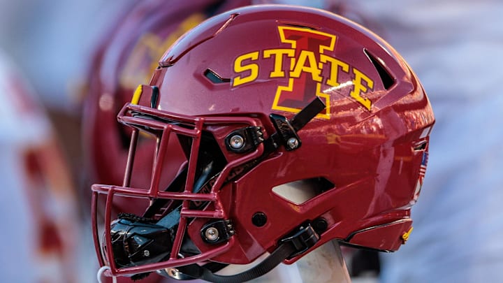 Nov 9, 2024; Kansas City, Missouri, USA; Iowa State Cyclones helmets on the bench during the first quarter against the Kansas Jayhawks at GEHA Field at Arrowhead Stadium. Mandatory Credit: William Purnell-Imagn Images Nov 9, 2024; Kansas City, Missouri, USA; Iowa State Cyclones helmets on the bench during the first quarter against the Kansas Jayhawks at GEHA Field at Arrowhead Stadium. Mandatory Credit: William Purnell-Imagn Images