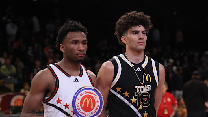 Apr 1, 2025; Brooklyn, NY, USA; McDonald's All American West guard Darryn Peterson (22) and McDonald's All American East forward Cameron Boozer (12) pose for photos after the game at Barclays Center. Mandatory Credit: Pamela Smith-Imagn Images Apr 1, 2025; Brooklyn, NY, USA; McDonald's All American West guard Darryn Peterson (22) and McDonald's All American East forward Cameron Boozer (12) pose for photos after the game at Barclays Center. Mandatory Credit: Pamela Smith-Imagn Images
