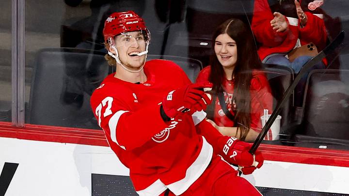 Mar 4, 2026; Detroit, Michigan, USA;  Detroit Red Wings defenseman Simon Edvinsson (77) celebrates after scoring in the first period against the Vegas Golden Knights at Little Caesars Arena. Mandatory Credit: Rick Osentoski-Imagn Images