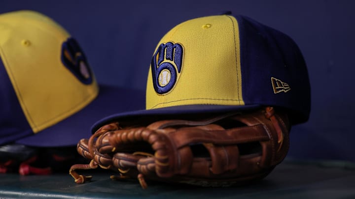 Jul 28, 2023; Atlanta, Georgia, USA; A detailed view of a Milwaukee Brewers hat and glove on the bench against the Atlanta Braves in the second inning at Truist Park. Mandatory Credit: Brett Davis-Imagn Images Jul 28, 2023; Atlanta, Georgia, USA; A detailed view of a Milwaukee Brewers hat and glove on the bench against the Atlanta Braves in the second inning at Truist Park. Mandatory Credit: Brett Davis-Imagn Images