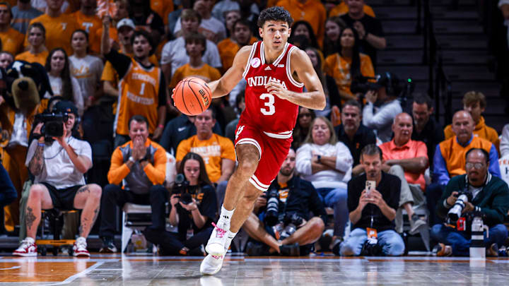 Indiana guard Anthony Leal brings the ball up the court against Tennessee. Indiana guard Anthony Leal brings the ball up the court against Tennessee.