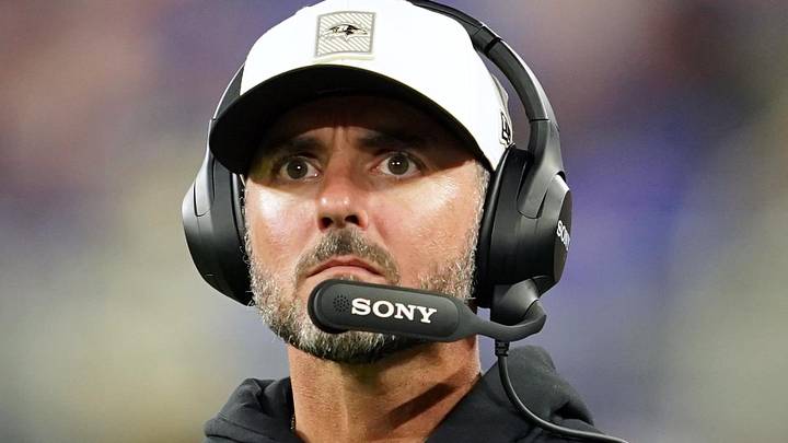 Baltimore Ravens head coach Jesse Minter watches a fourth quarter replay against the Philadelphia Eagles.