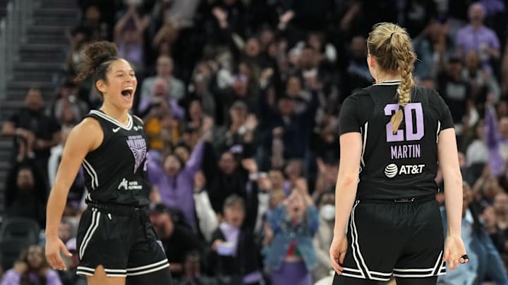 Jun 7, 2025; San Francisco, California, USA; Golden State Valkyries guard Kate Martin (20) reacts with guard Veronica Burton (left) after making a three point basket against the Las Vegas Aces to end the second quarter at Chase Center. Mandatory Credit: Darren Yamashita-Imagn Images