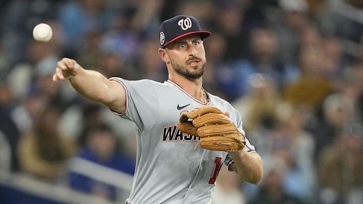 Apr 1, 2025; Toronto, Ontario, CAN; Washington Nationals third baseman Paul DeJong (14) throws out Toronto Blue Jays third baseman Ernie Clement (not pictured) at first base during the eighth inning at Rogers Centre. Apr 1, 2025; Toronto, Ontario, CAN; Washington Nationals third baseman Paul DeJong (14) throws out Toronto Blue Jays third baseman Ernie Clement (not pictured) at first base during the eighth inning at Rogers Centre.