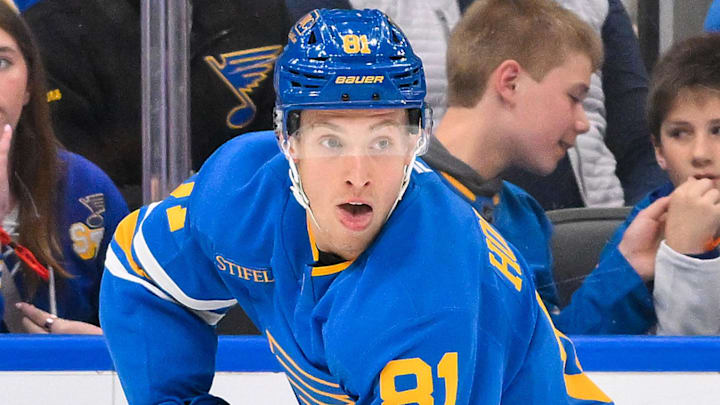 Mar 28, 2026; St. Louis, Missouri, USA; St. Louis Blues left wing Dylan Holloway (81) controls the puck against the Toronto Maple Leafs during the second period at Enterprise Center. Mandatory Credit: Jeff Curry-Imagn Images