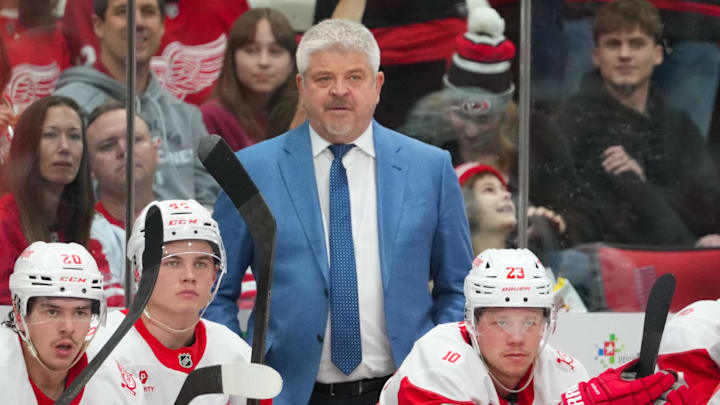 Feb 28, 2026; Raleigh, North Carolina, USA;  Detroit Red Wings head coach Todd McLellan looks on against the Carolina Hurricanes during the third period at Lenovo Center. Mandatory Credit: James Guillory-Imagn Images