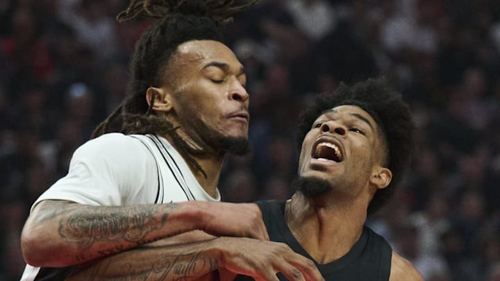 Portland Trail Blazers guard Scoot Henderson drives to the basket against San Antonio Spurs guard Stephon Castle.
